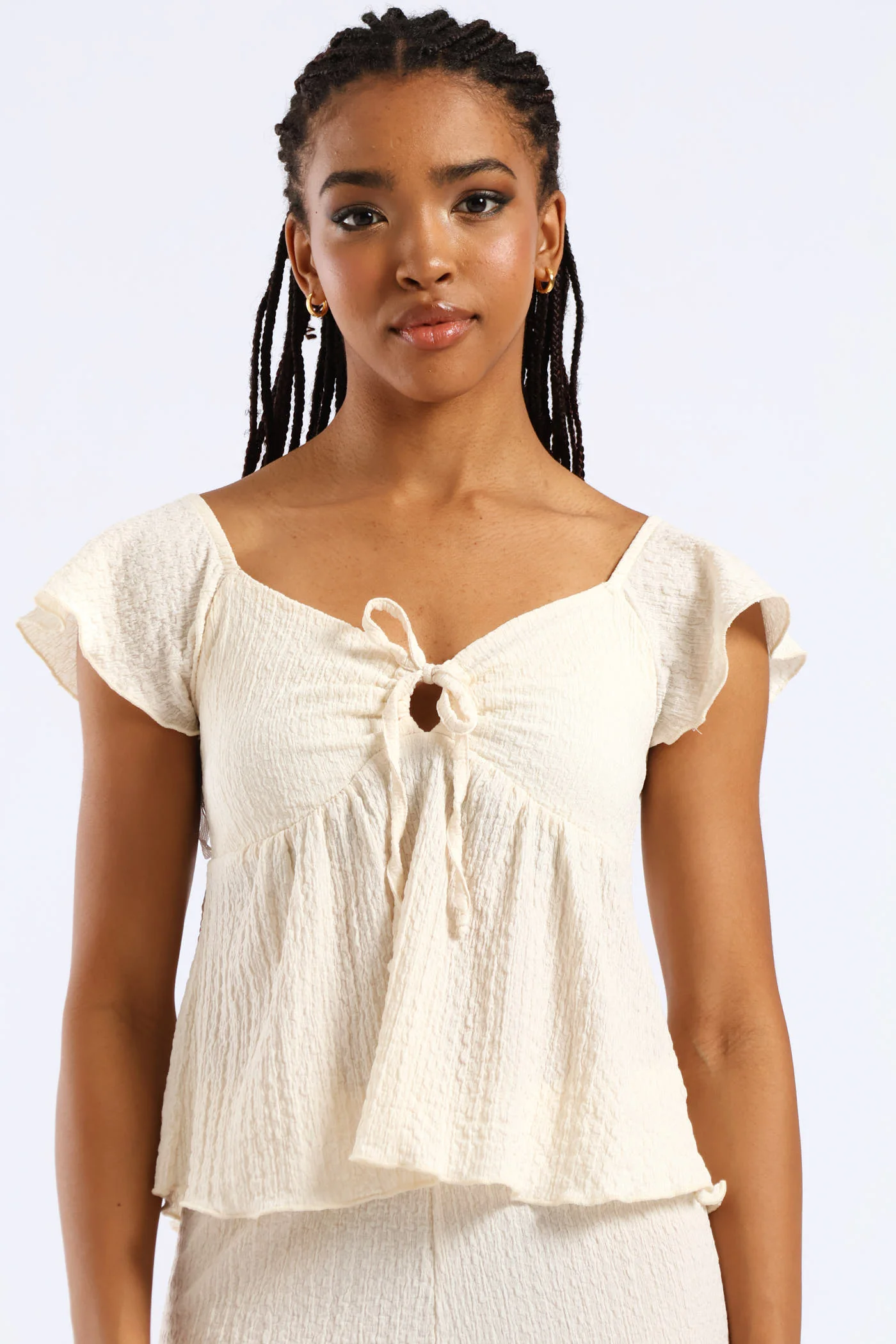 Crinkle Knit Peplum Top - Cream