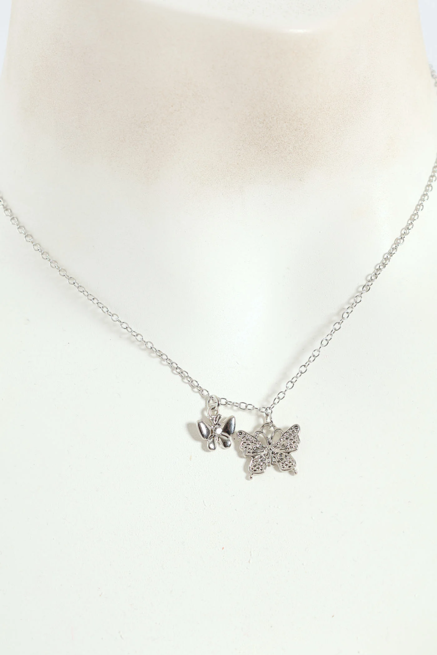 Double Butterfly Pendant Necklace And Matching Earrings - Silver