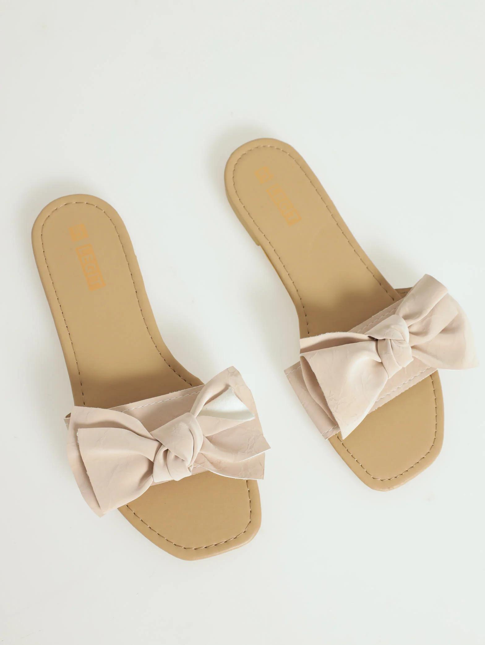 Flat One Strap Bow Push In Mule Sandal