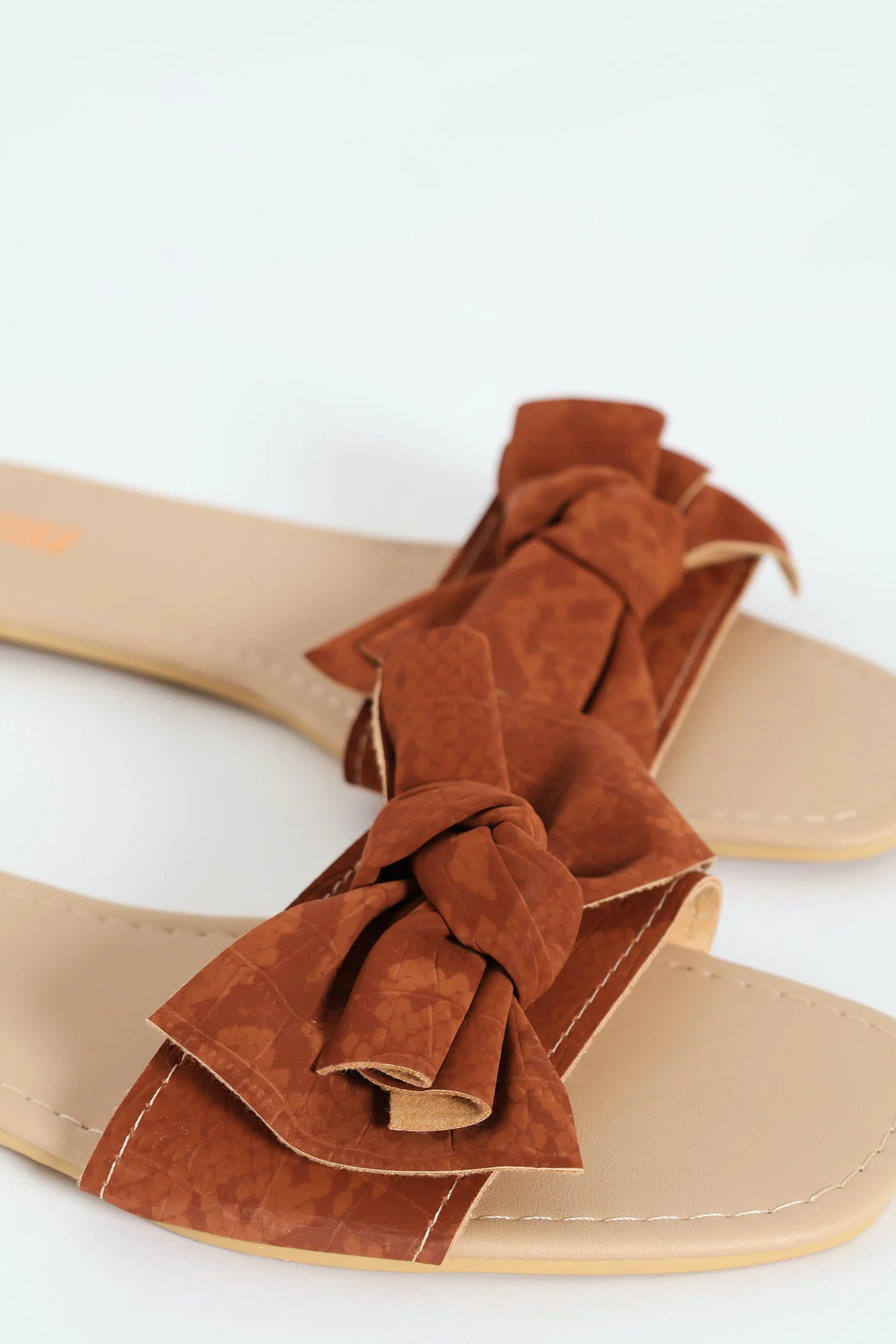Flat One Strap Snake Skin Bow Mule Sandal - Rust - Image 2