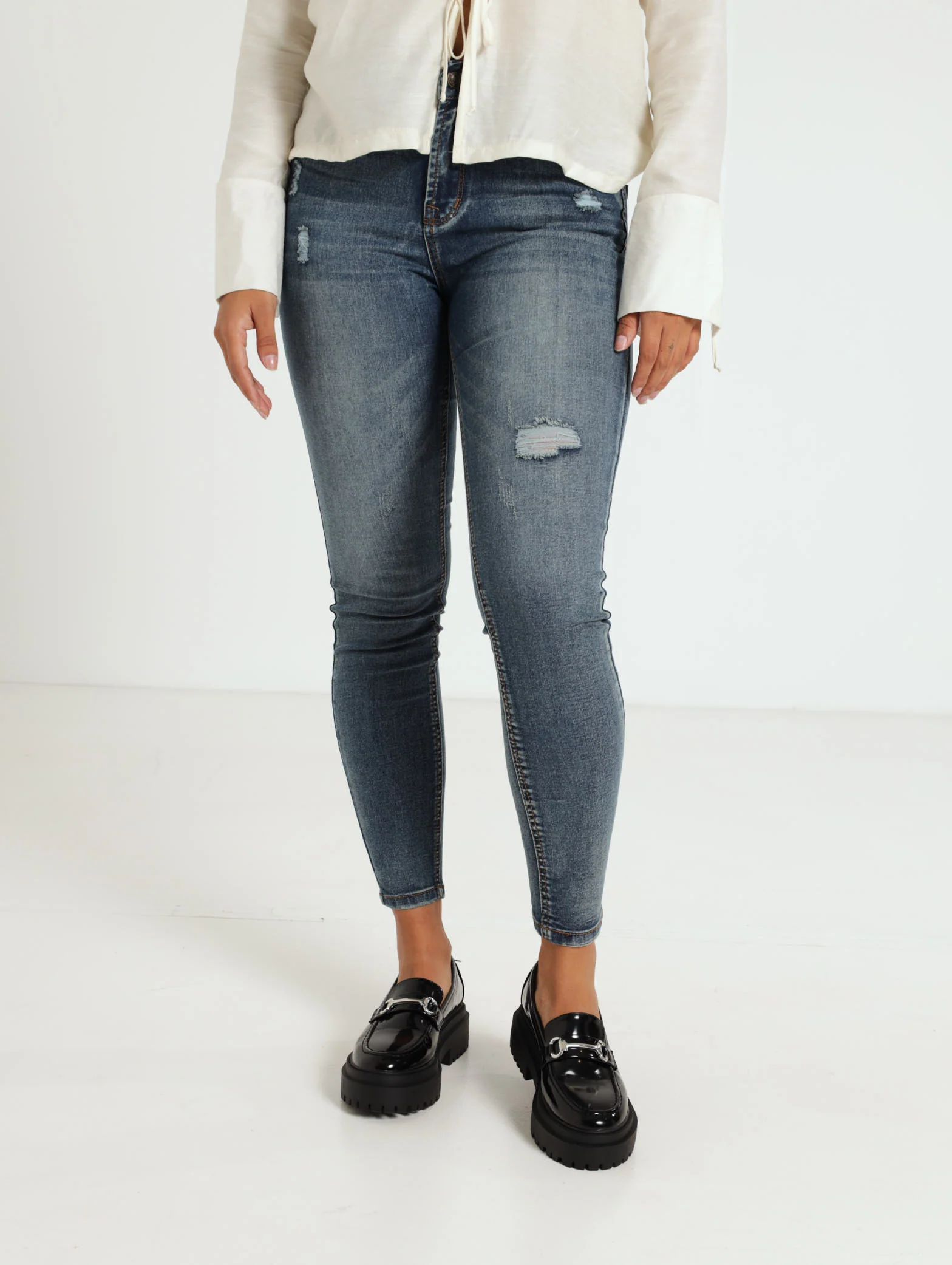 Tea Stained Abraised Skinny Jean